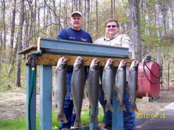 Captain Bill and Ben with Lake Trout